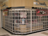 Side-Folding Grilles & Closure with Glazed or Solid Panels